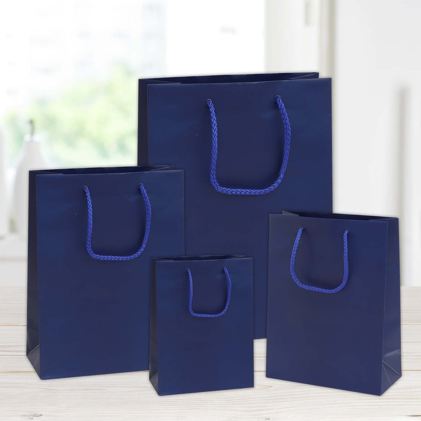 shopper in carta plastificata opaca color 10x6,5x12 blu