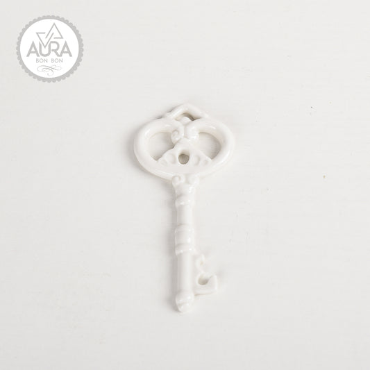 Chiave bianca in ceramica 9,2x4,2x0,5cm