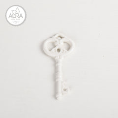 White ceramic key 9.2x4.2x0.5cm