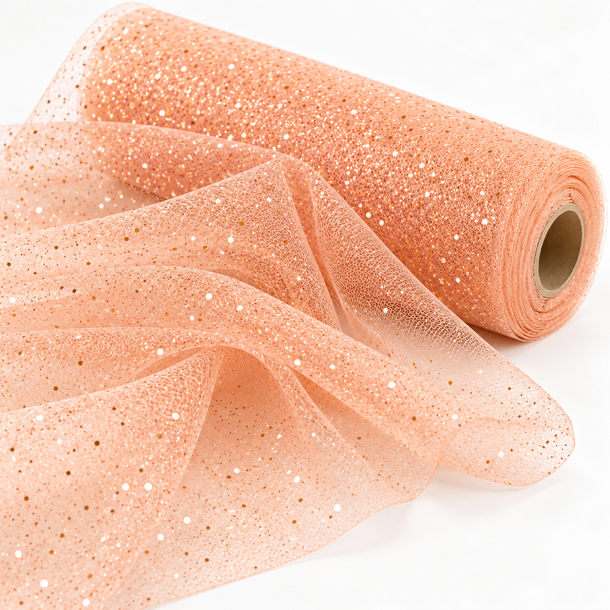 Tulle glitter pesca Aura, tessuto semitrasparente con pieghe e punti luce