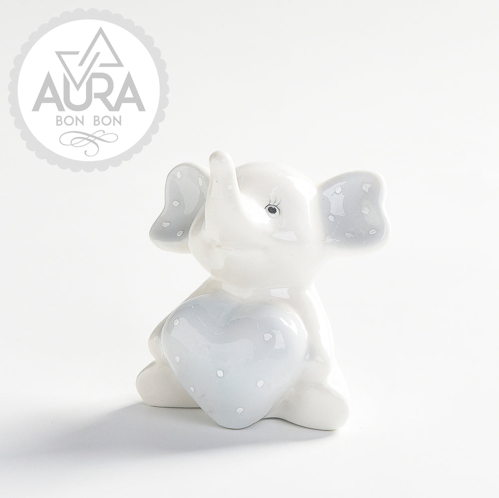 Elephant with a light blue heart in light blue porcelain 8x5.6x8.5cm