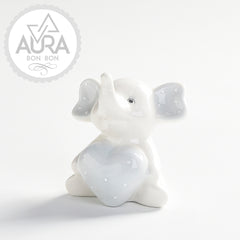 Elephant with a light blue heart in light blue porcelain 8x5.6x8.5cm